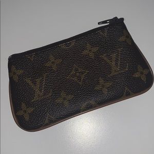 Lou V coin bag